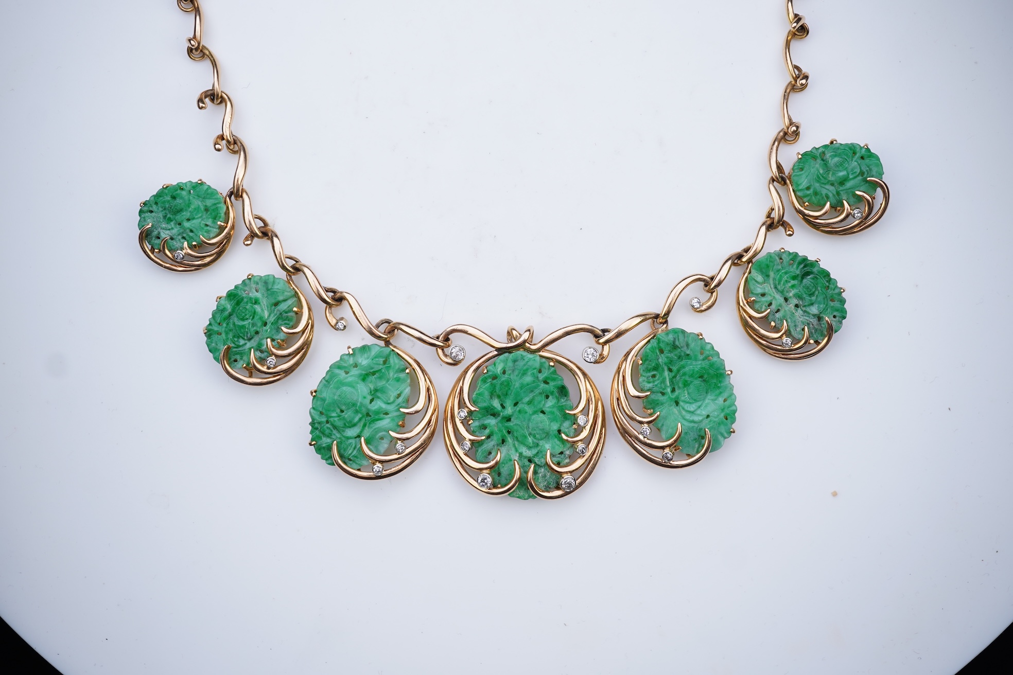 A jadeite and diamond necklace, mid 20th century